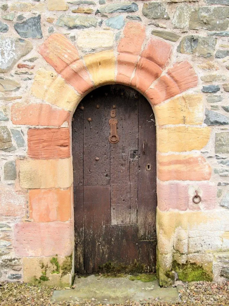 The old entrance to Aikwood Tower - with colourful stone surround