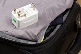 Travel adaptor and suitcase