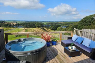 Hot tub deck at Kekaroka Lodge in Cumbria